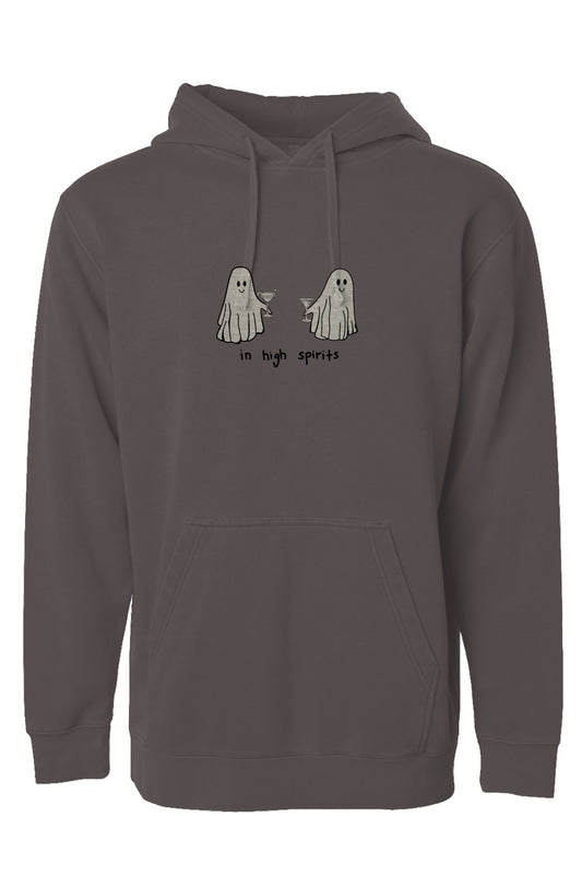 A black hoodie with a design on it of two cute little ghosts smiling and sharing cocktails, they also have an extra added vintage look to them. The text on the design says "in high spirits: